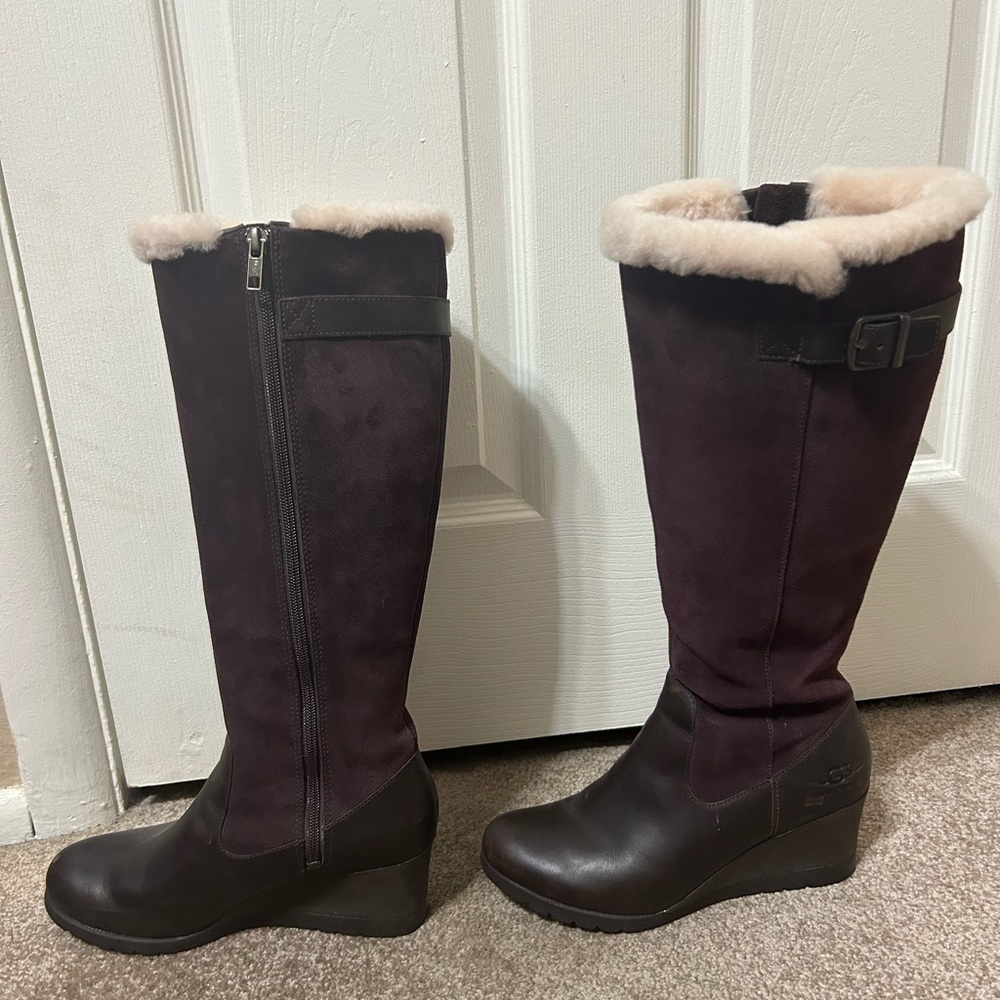 UGG. Size 8. Brown with fur trim. Small scuff on front toe. Wedge heal.
